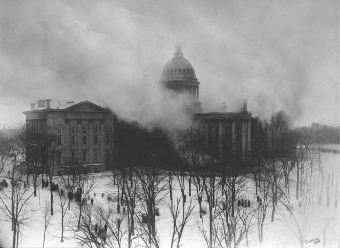 distant view of the wisconsin capitol on fire in 1904
